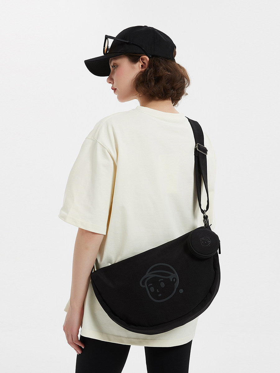 FINERWORLD Crescent Dumpling Crossbody Bag in Deep Black - on-body shot