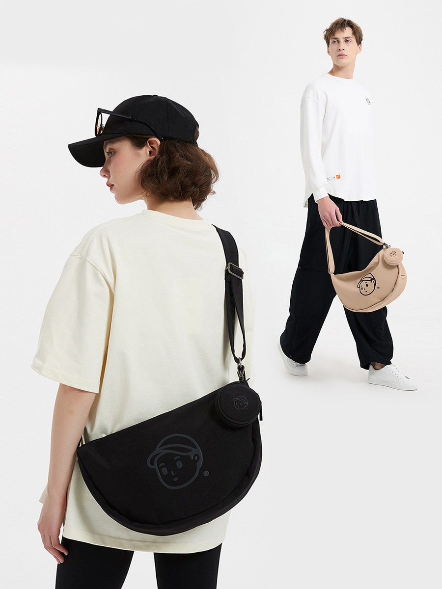 FINERWORLD Crescent Dumpling Crossbody Bag in Deep Black - on-body shot