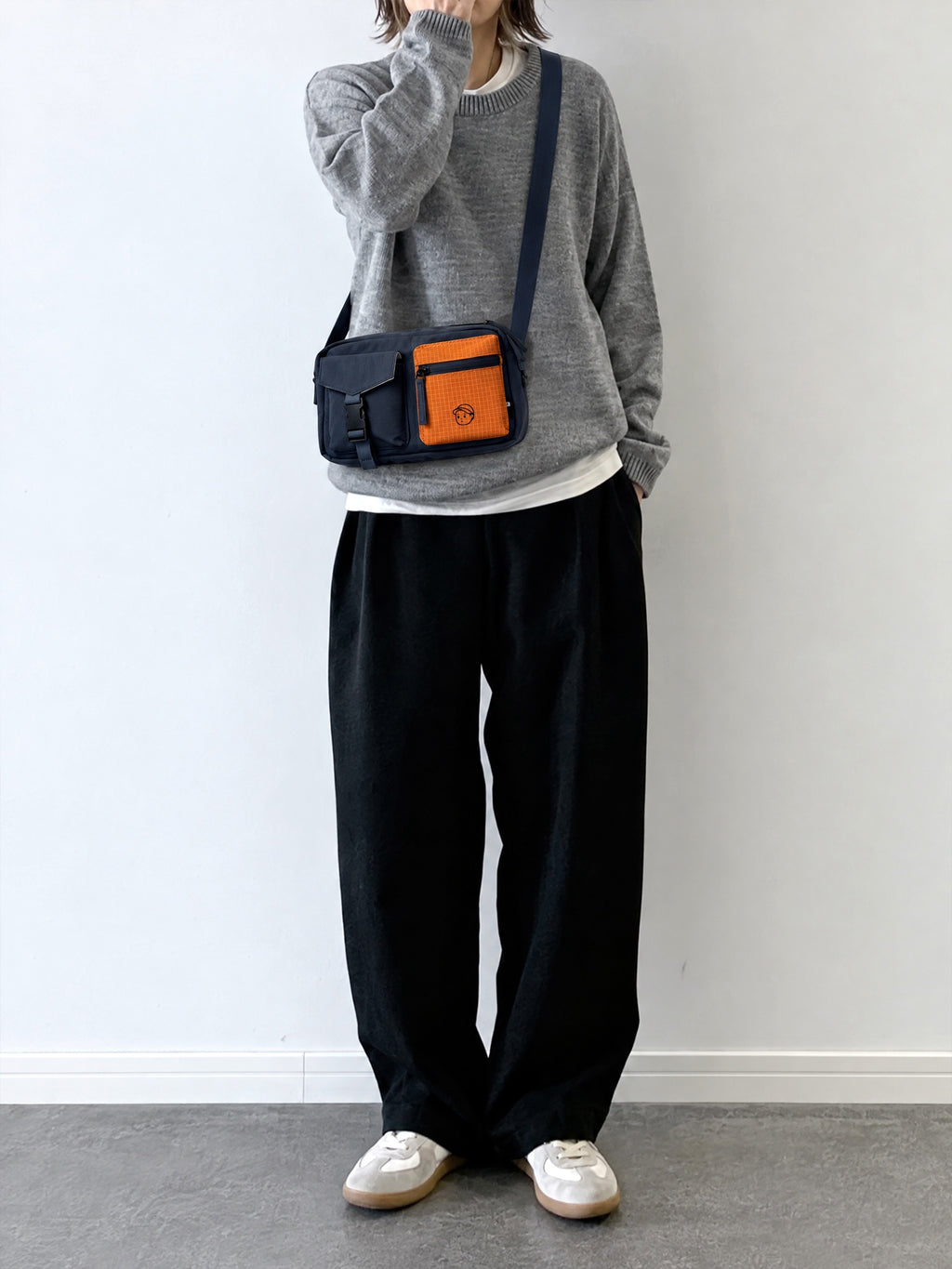 FINERWORLD C1 Patch Pocket Crossbody Bag in Navy - on-body shot 02