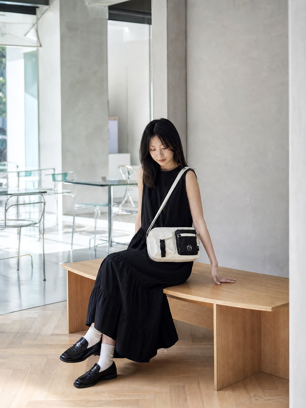 FINERWORLD C1 Patch Pocket Crossbody Bag in Soft Beige - on-body shot 02