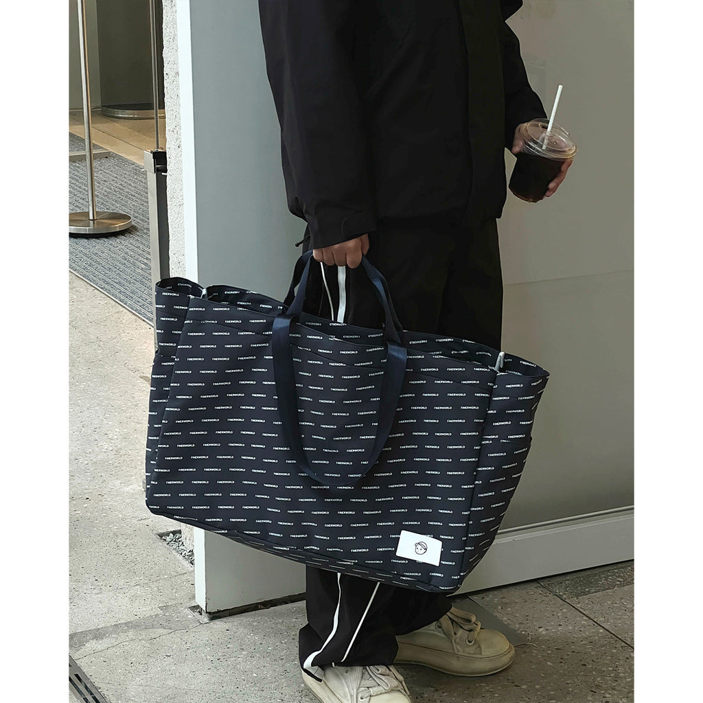 Escape Tote Bag in Navy – on-body shot 01