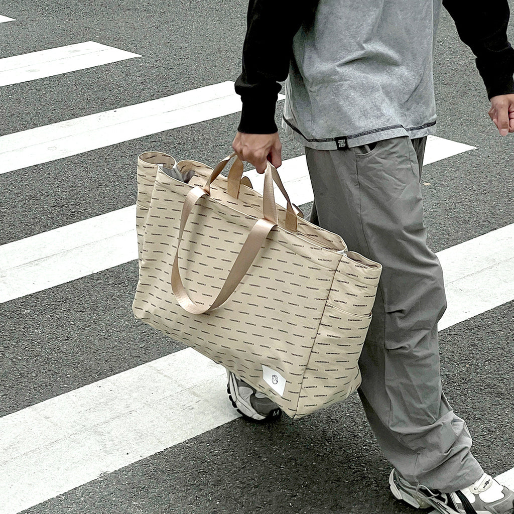 Escape Tote Bag in Rock Sand – on-body shot 01