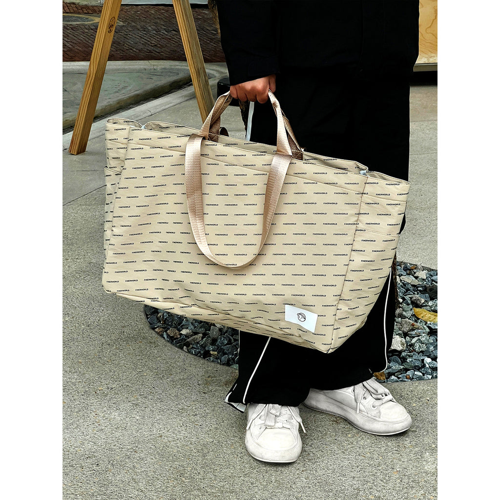 Escape Tote Bag in Rock Sand – on-body shot 02