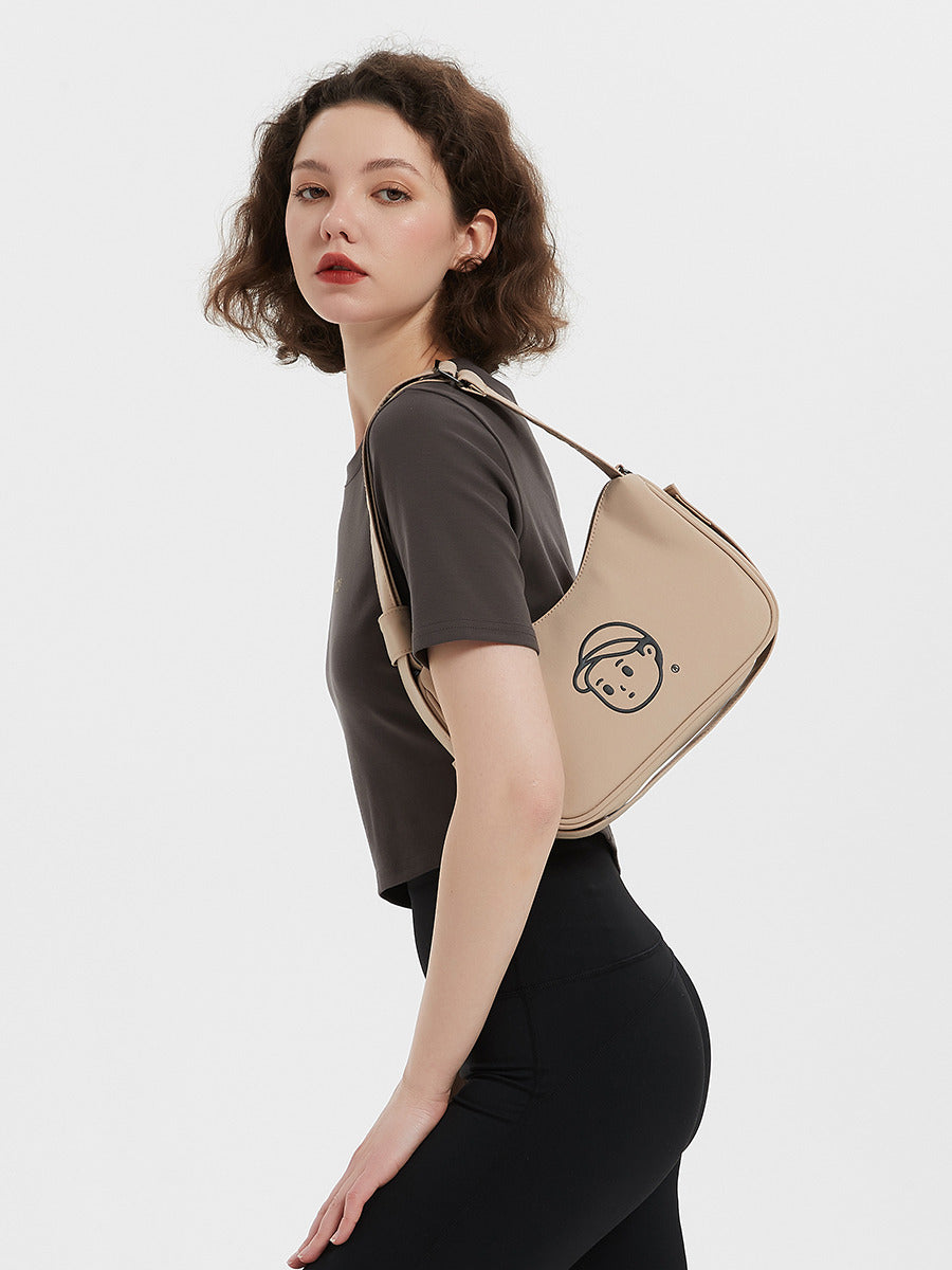 Nylon Shoulder Bag in Rock Sand – on-body shot 01