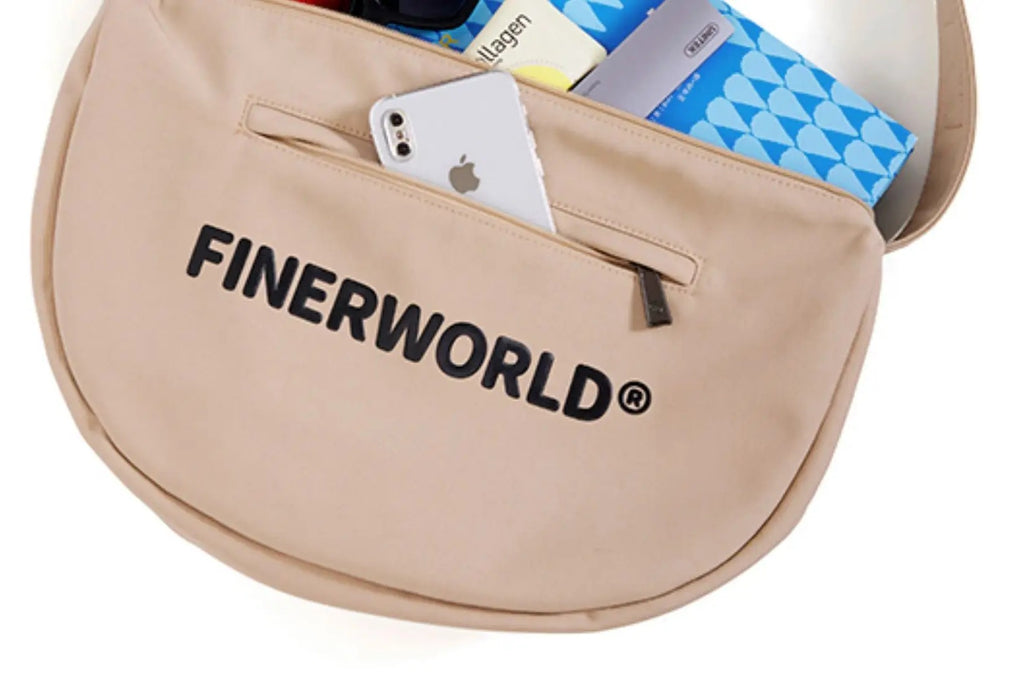FINERWORLD Crescent Dumpling Crossbody Bag in Rock Sand - studio angle