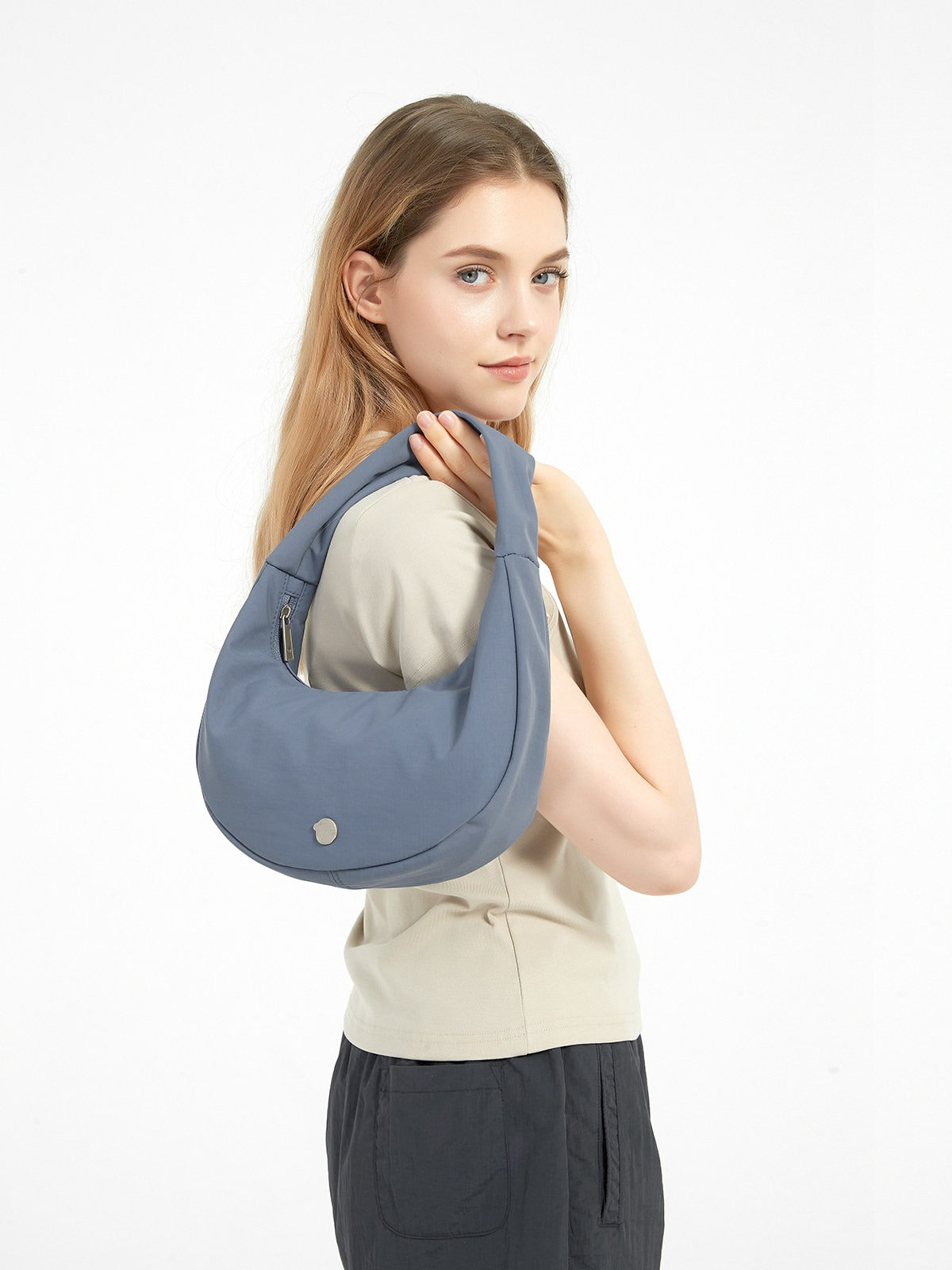 FINERWORLD Ultralight Nylon Underarm Bag in Mist Blue - on-body shot 02